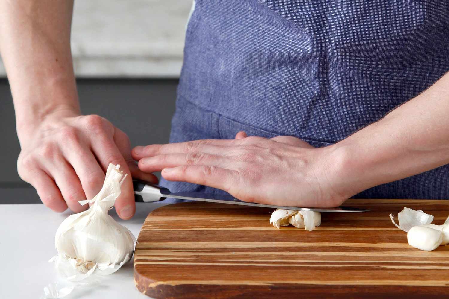 Smash the garlic. 
