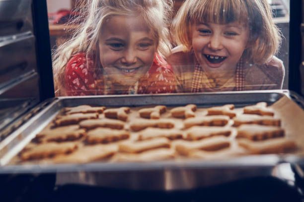Wait for the cake to bake.
