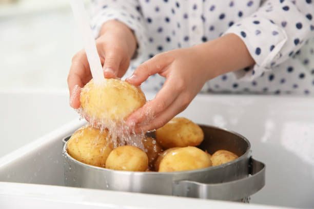 Wash the potatoes. 